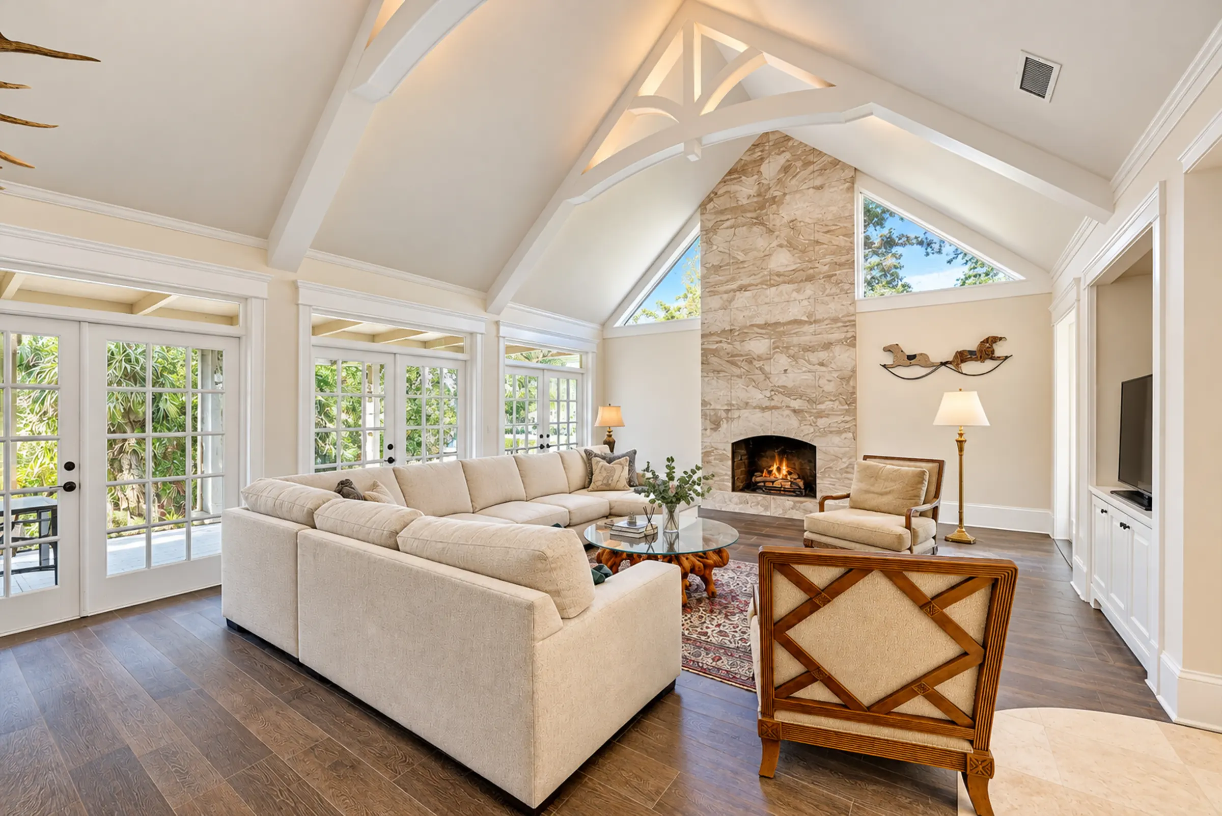 Great room with masonry fireplace and cathedral ceiling